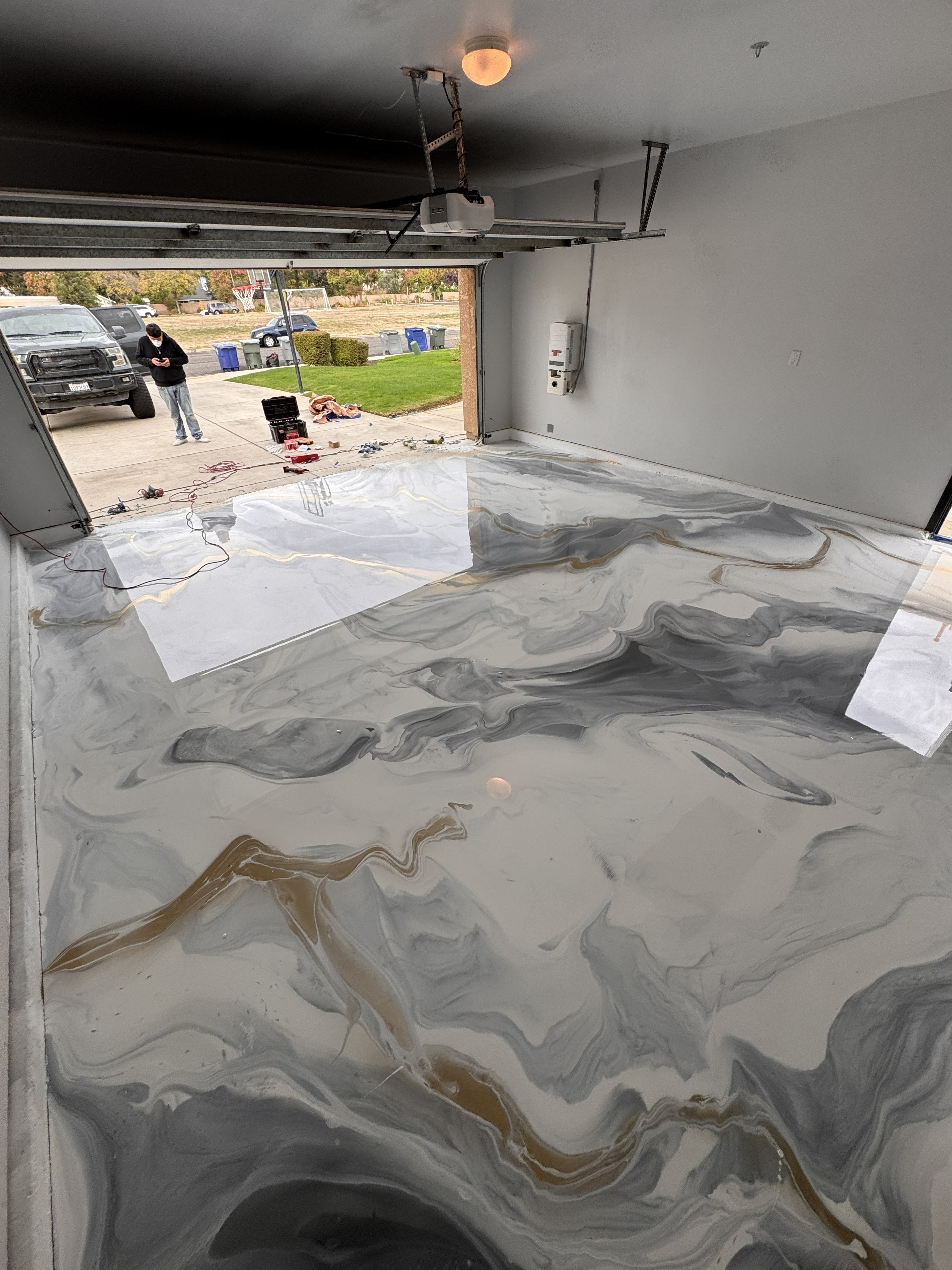 Metallic epoxy floor installation in progress