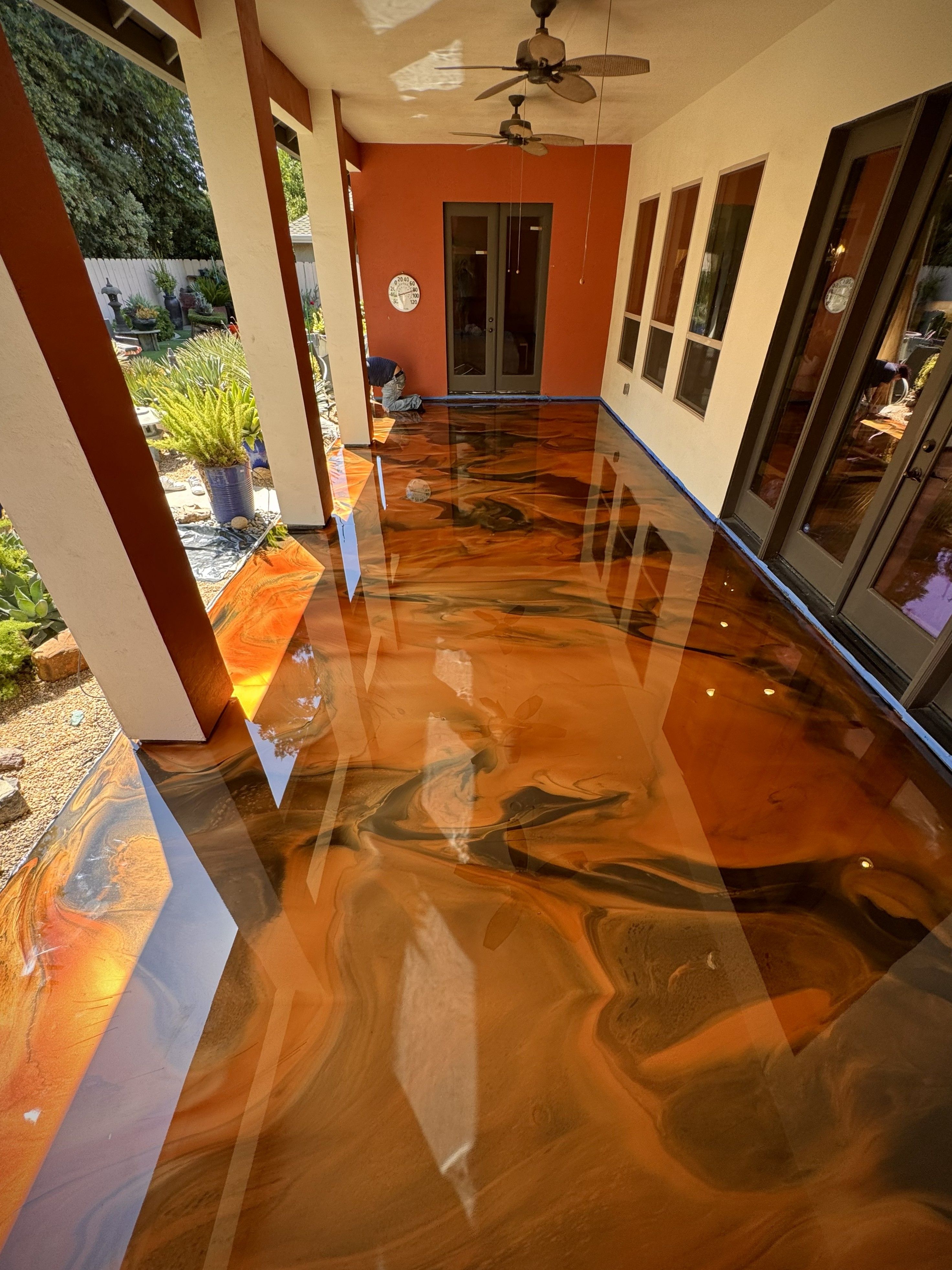 Orange copper metallic epoxy patio floor
